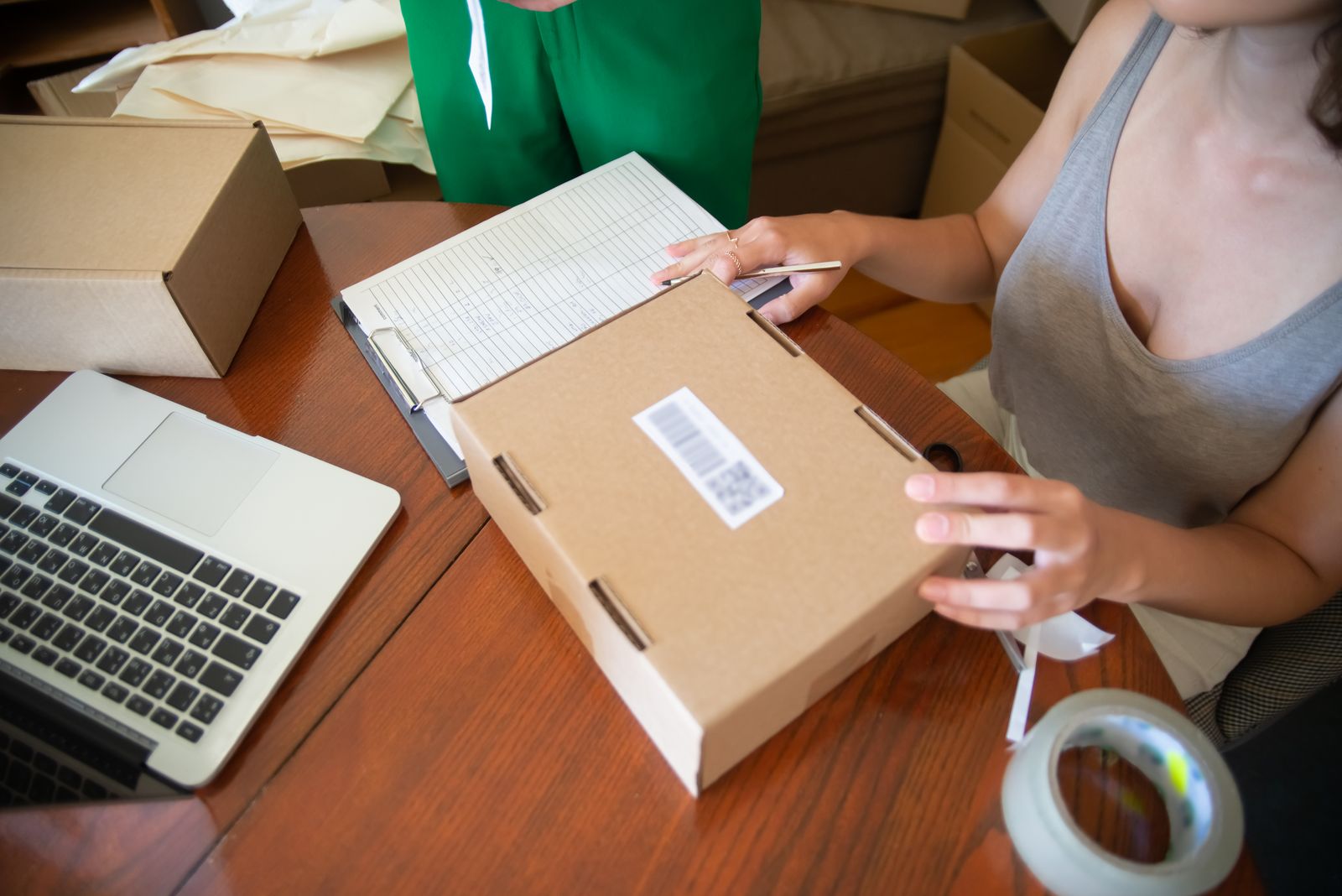 Packing online orders at a desk